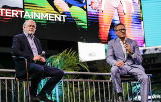 Richard Cregan (CEO) and Tom Garfinkel (Managing Partner) speak at an event for the Formula 1 Miami Grand Prix